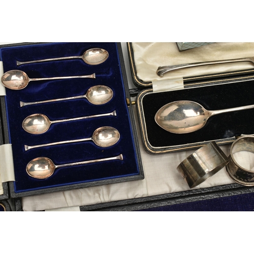 124 - A BOX OF ASSORTED SILVER ITEMS, to include a cased set of seven golfing teaspoons, each hallmarked B... 