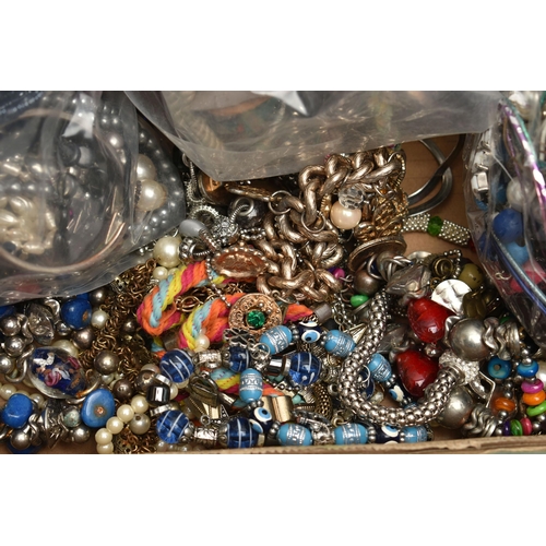 140 - A LARGE BOX OF ASSORTED COSTUME JEWELLERY, to include a selection of necklaces, bracelets, earrings,... 