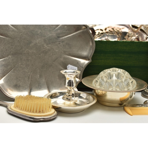 144 - A BOX OF MAINLY SILVER PLATED WARE, to include a pair of chambersticks, a dressing table set, a cand... 