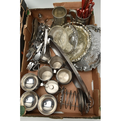 145 - A LARGE ASSORTMENT OF WHITE METAL WARE, to include a candelabra, two trays, a rose bowl, toast racks... 