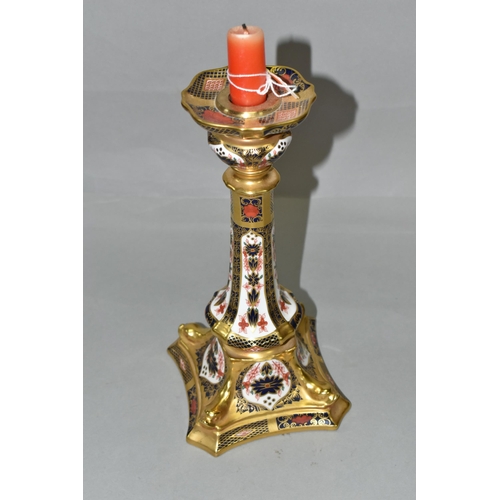 354 - A ROYAL CROWN DERBY OLD IMARI 1128 SOLID GOLD BAND  CANDLESTICK, heavily gilded with dolphin detail ... 