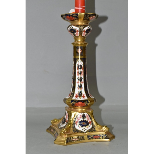 354 - A ROYAL CROWN DERBY OLD IMARI 1128 SOLID GOLD BAND  CANDLESTICK, heavily gilded with dolphin detail ... 