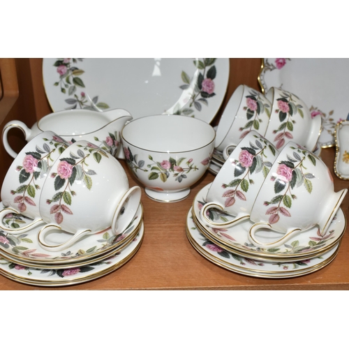 386 - A COLLECTION OF TEA WARES, to include a twenty one piece Wedgwood Hathaway Rose tea set, comprising ... 