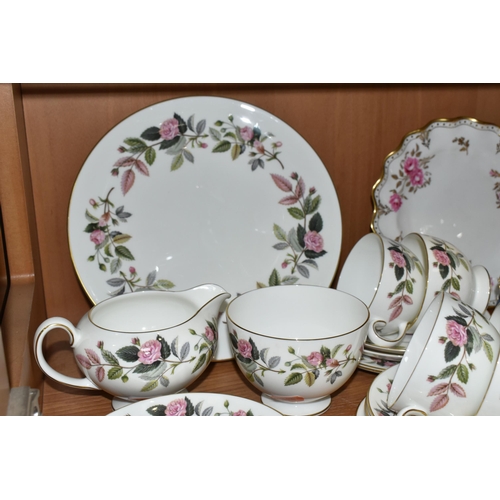 386 - A COLLECTION OF TEA WARES, to include a twenty one piece Wedgwood Hathaway Rose tea set, comprising ... 