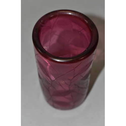 388 - TWO PIECES OF CRANBERRY GLASS, to include a cylindrical vase etched with leaves, signed '(Jonathan?)... 