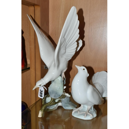 389 - TWO LLADRO DOVES, A NAO DOVE AND A NAO CAT, comprising Lladro Turtle Dove, model no 4550, perched on... 