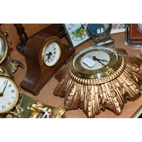 391 - A COLLECTION OF SMALL CLOCKS, to include a miniature glass cased carriage clock with visible movemen... 