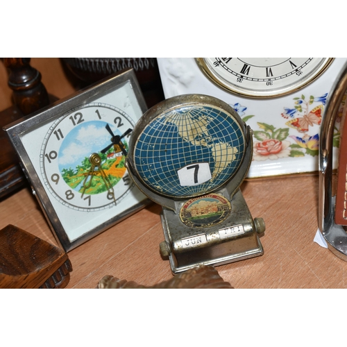 391 - A COLLECTION OF SMALL CLOCKS, to include a miniature glass cased carriage clock with visible movemen... 