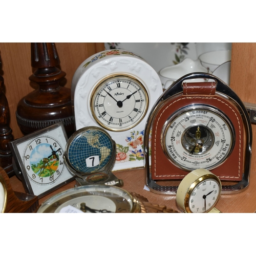 391 - A COLLECTION OF SMALL CLOCKS, to include a miniature glass cased carriage clock with visible movemen... 