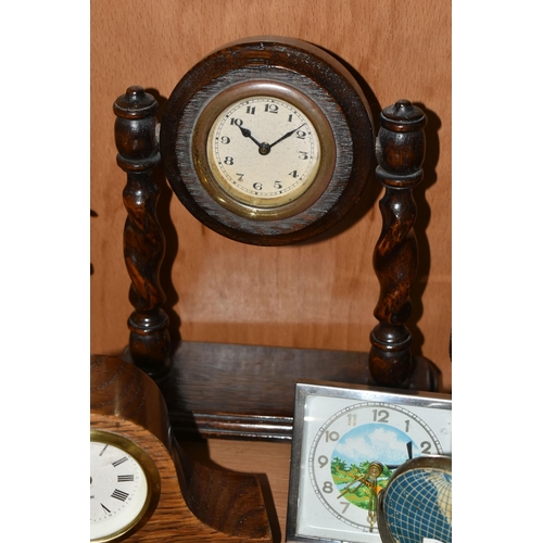 391 - A COLLECTION OF SMALL CLOCKS, to include a miniature glass cased carriage clock with visible movemen... 