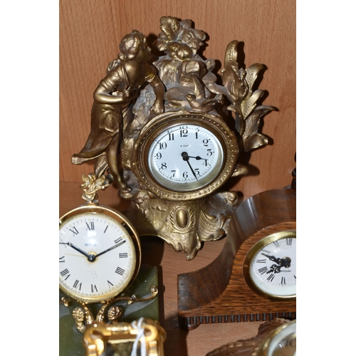 391 - A COLLECTION OF SMALL CLOCKS, to include a miniature glass cased carriage clock with visible movemen... 