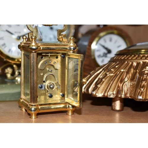 391 - A COLLECTION OF SMALL CLOCKS, to include a miniature glass cased carriage clock with visible movemen... 