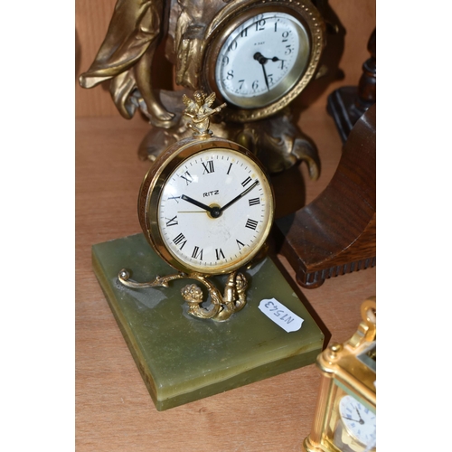 391 - A COLLECTION OF SMALL CLOCKS, to include a miniature glass cased carriage clock with visible movemen... 