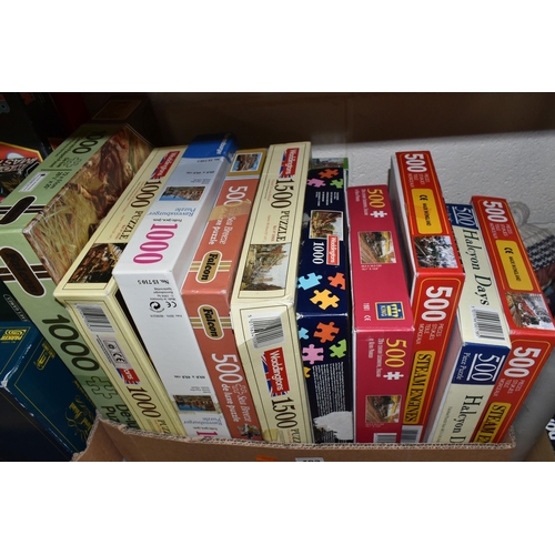 403 - THREE BOXES OF TOYS AND GAMES, to include eleven jigsaw puzzles, games including Master Mind, Scrabb... 