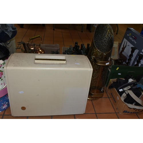 415 - FOUR BOXES OF MISCELLANEOUS SUNDRIES, to include a 1960's Singer sewing machine 700/720 with instruc... 