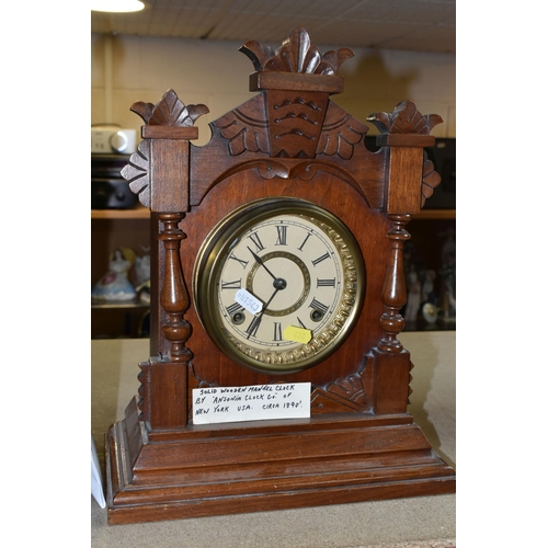 418 - TWO LATE 19TH /EARLY 20TH CENTURY MANTEL CLOCKS, comprising a walnut cased American Ansonia example ... 