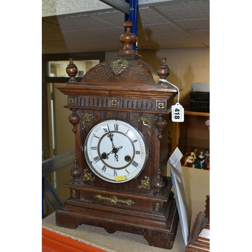 418 - TWO LATE 19TH /EARLY 20TH CENTURY MANTEL CLOCKS, comprising a walnut cased American Ansonia example ... 