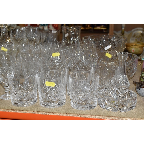 420 - A COLLECTION OF CUT CRYSTAL, all of a similar pattern comprising a set of six white wine glasses, si... 