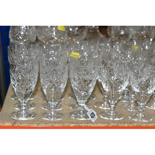 420 - A COLLECTION OF CUT CRYSTAL, all of a similar pattern comprising a set of six white wine glasses, si... 