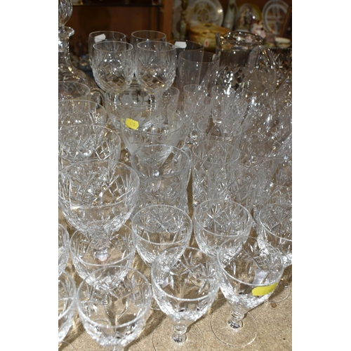 420 - A COLLECTION OF CUT CRYSTAL, all of a similar pattern comprising a set of six white wine glasses, si... 