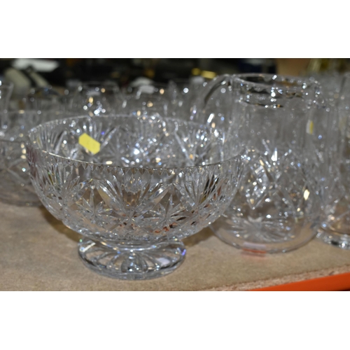 420 - A COLLECTION OF CUT CRYSTAL, all of a similar pattern comprising a set of six white wine glasses, si... 