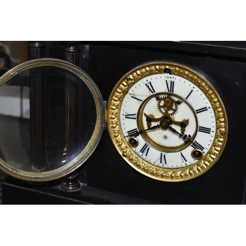 428 - A 19TH CENTURY BLACK SLATE MANTEL CLOCK, architectural form, with four columns to the front, gilt be... 