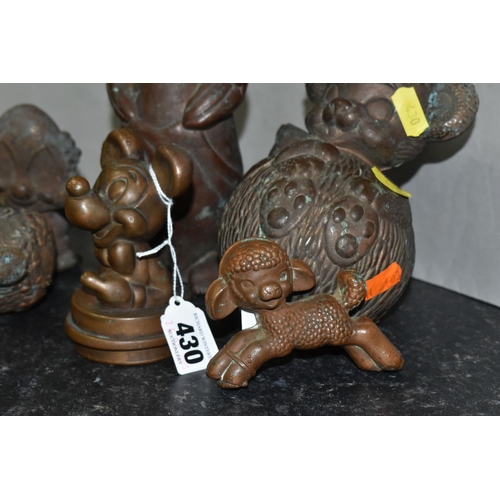 430 - SIX BRONZED METAL FIGURES, to include 'Mickey Mouse' a lamb, clown, laughing duck, together with a p... 