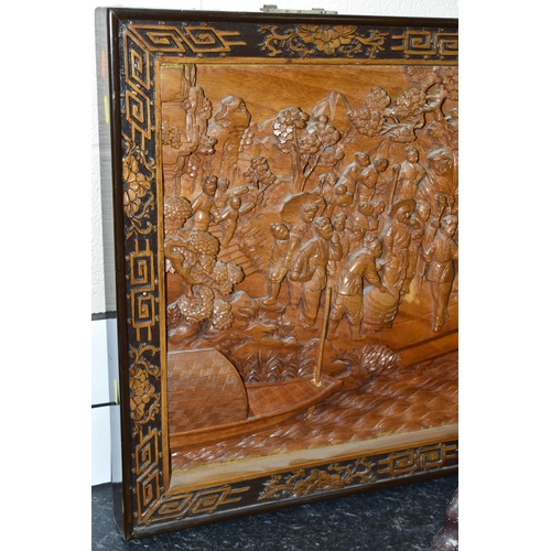 431 - A LARGE ORIENTAL CAMPHOR WOOD WALL HANGING AND FOUR ORIENTAL CARVED STONE ORNAMENTS, comprising a la... 