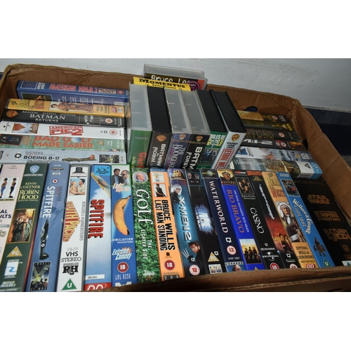 452 - FOUR BOXES OF VHS TAPES, DVDS AND CDS, to include approximately one hundred VHS tapes including Disn... 