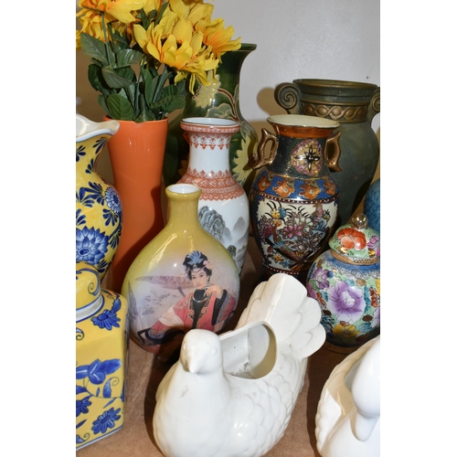 453 - A COLLECTION OF CERAMIC VASES, to include largely modern pieces, some of an Oriental style, a small ... 