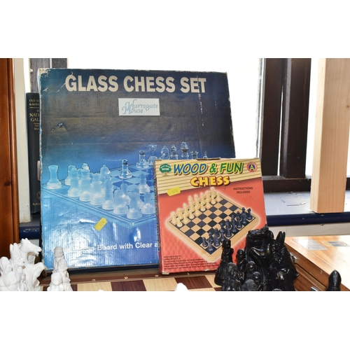 476 - SIX SETS OF CHESS, comprising an Estrella wooden case of 'Classic Games', a small table top chess bo... 