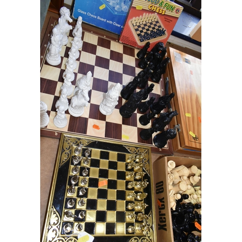 476 - SIX SETS OF CHESS, comprising an Estrella wooden case of 'Classic Games', a small table top chess bo... 