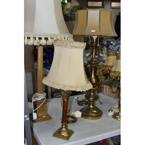 508 - A GROUP OF BRASS TABLE LAMPS, together with a French Provincial grape and wheat sheaf harvest motif ... 