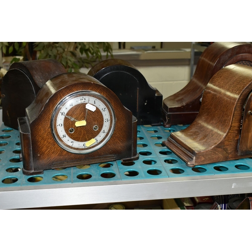 511 - FIVE EARLY TO MID 20TH CENTURY WOODEN CASED DOME TOP MANTEL CLOCKS, including a Smiths Enfield and a... 