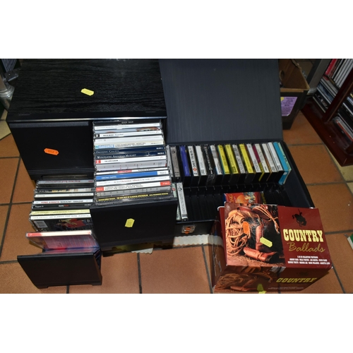 517 - FOUR BOXES, TWO CD RACKS AND ONE CASE, containing a large collection of (several hundred) CD's, Cass... 