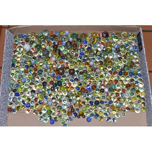 568 - ONE BOX OF VINTAGE MARBLES, with a plastic Solitaire board, assorted colours and styles, condition m... 