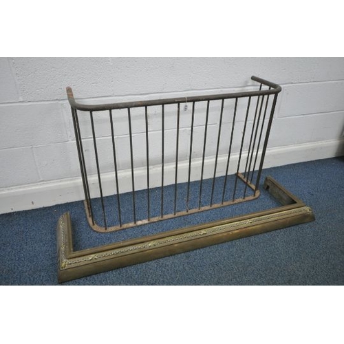 1198 - A VICTORIAN BRASS SPINDLED NURSERY FENDER, length 110m x depth 34cm x height 69cm, and a brass fende... 