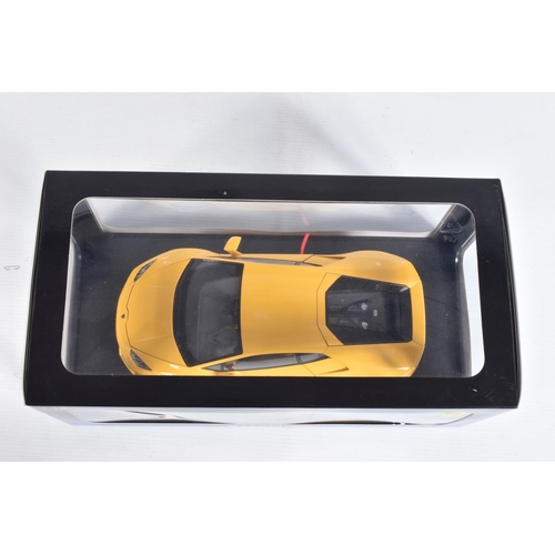 10 - A BOXED AUTOART LAMBORGHINI HURACÁN LP 610-4 1:18 MODEL VEHICLE, numbered 74604, in yellow, appears ... 