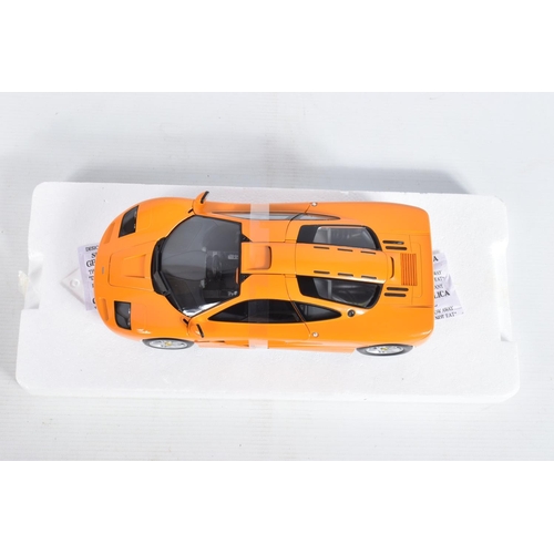 24 - A BOXED MINICHAMPS MCLAREN F1 ROAD CAR 1994 1:18 MODEL VEHICLE, numbered 530 133421, painted orange,... 