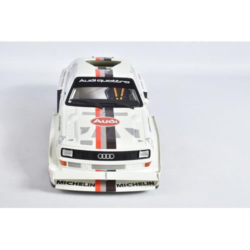 26 - A BOXED OTTO MOBLIE AUDI QUATRO S1 PIKES PEAK HILL CLIMB 1987 1:12 MODEL VEHICLE, numbered, painted ... 