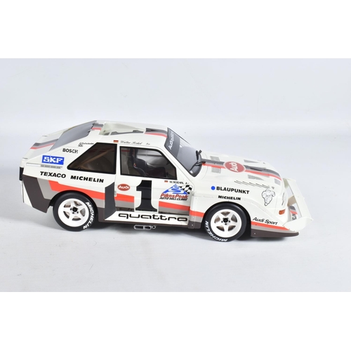 26 - A BOXED OTTO MOBLIE AUDI QUATRO S1 PIKES PEAK HILL CLIMB 1987 1:12 MODEL VEHICLE, numbered, painted ... 