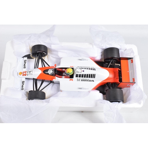 29 - A BOXED MINICHAMPS MCLAREN MP 4/4 HONDA AYRTON SENNA 1:18 MODEL RACECAR, numbered 540 881812, painte... 