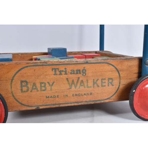 42 - A TRI-ANG BABY WALKER, wooden construction with red painted wheels and black tyres, blue handle with... 