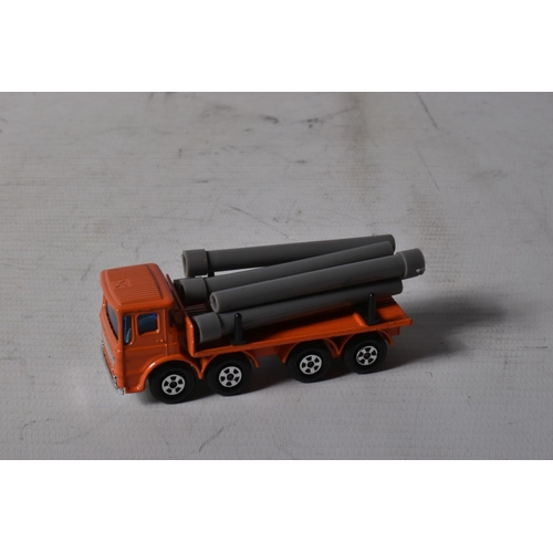 59 - FOUR BOXED MATCHBOX SUPERFAST DIE-CAST MODEL HEAVY VEHICLES, to include a PipeTruck no.10, orange bo... 