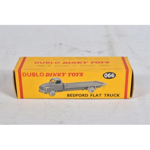 62 - FOUR BOXED DUBLO DINKY DIECAST VEHICLES, Austin Lorry, No.064, Bedford Flat Truck, No.066, A.E.C. Me... 