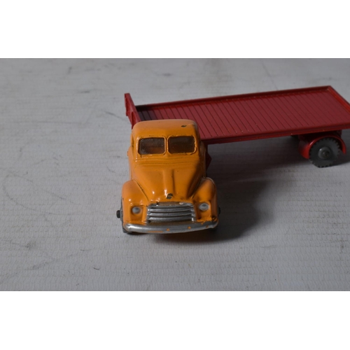 62 - FOUR BOXED DUBLO DINKY DIECAST VEHICLES, Austin Lorry, No.064, Bedford Flat Truck, No.066, A.E.C. Me... 