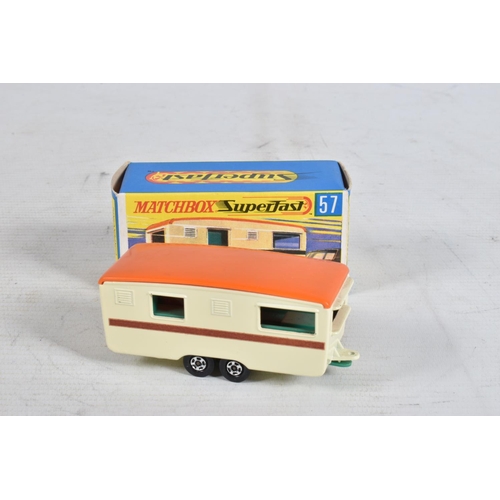 73 - SEVEN BOXED MATCHBOX DIE-CAST MODELS, the first is a Long Distance Coach no.40 in metallic blue, bla... 