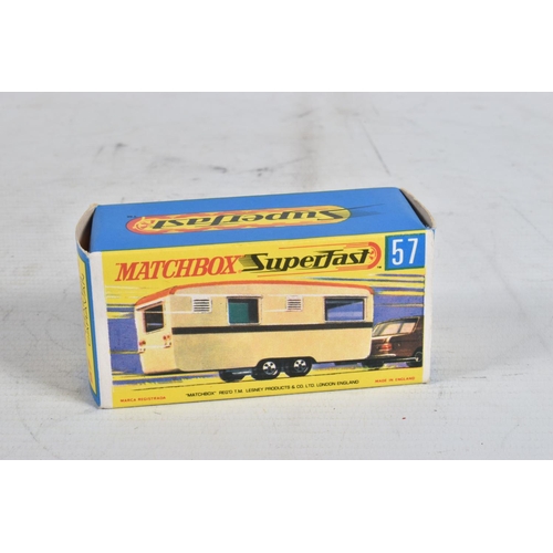 73 - SEVEN BOXED MATCHBOX DIE-CAST MODELS, the first is a Long Distance Coach no.40 in metallic blue, bla... 