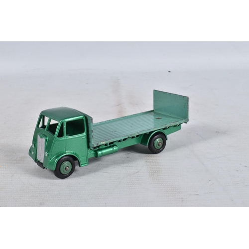 107 - FIVE UNBOXED AND ASSORTED DINKY TOYS GUY LORRIES AND VANS, all have been modified, rebuilt and/or re... 