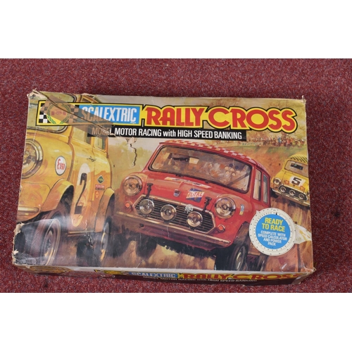 108 - A BOXED SCALEXTRIC RALLY CROSS MODEL MOTOR RACING WITH HIGH SPEED BANKING SET, poorly kept set with ... 